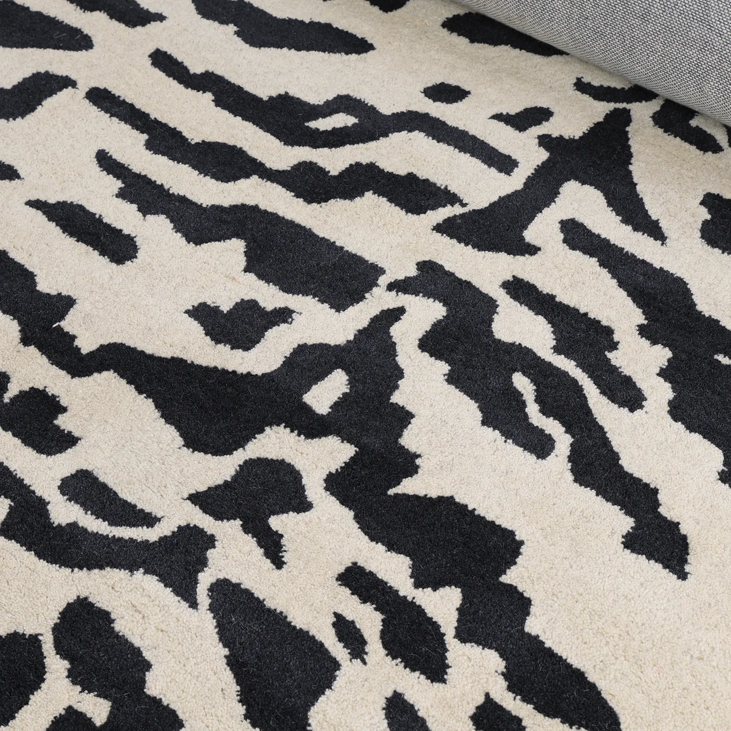 Dywany shaggy - Zebra Tufted Wool Premium (biały/czarny)